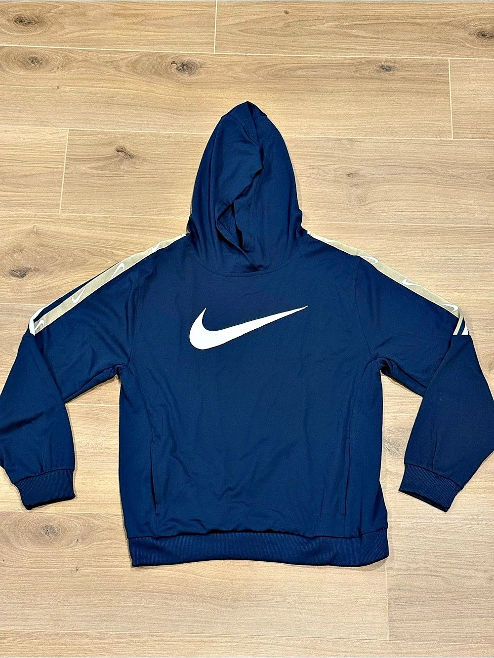 Nike Sportswear Repeat Pullover Hoodie Blue with Gold strip down the sleeve